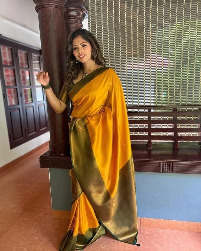 Bewitching Yellow Soft Silk Saree with Lissome Blouse Piece