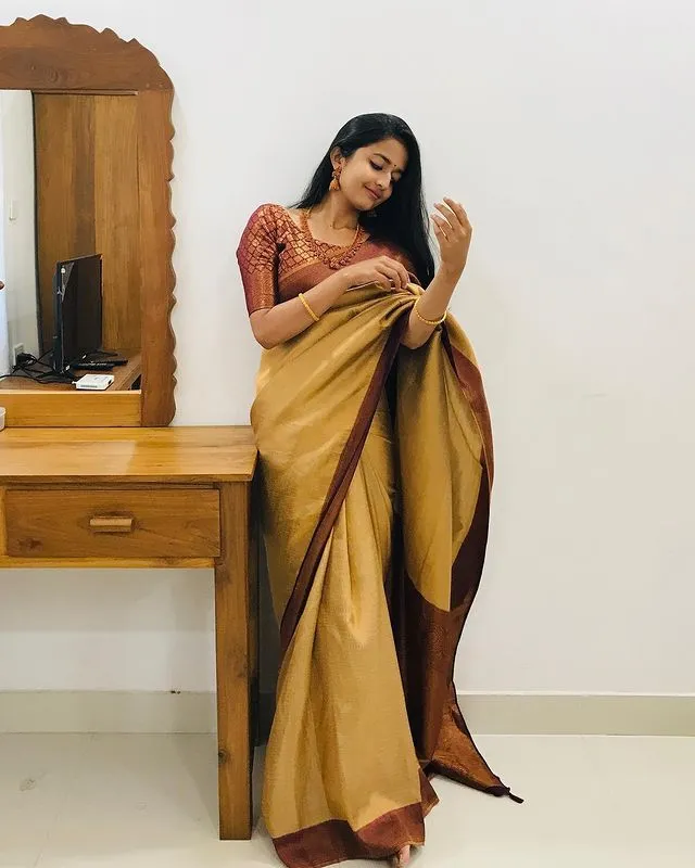 Gratifying Musturd Soft Silk Saree with Dazzling Blouse Piece