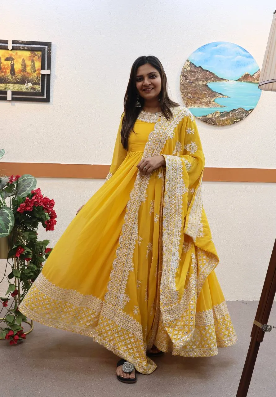 Yellow Fox Georgette Sequin Embroidered Gown with Flowing Skirt and Matching Dupatta