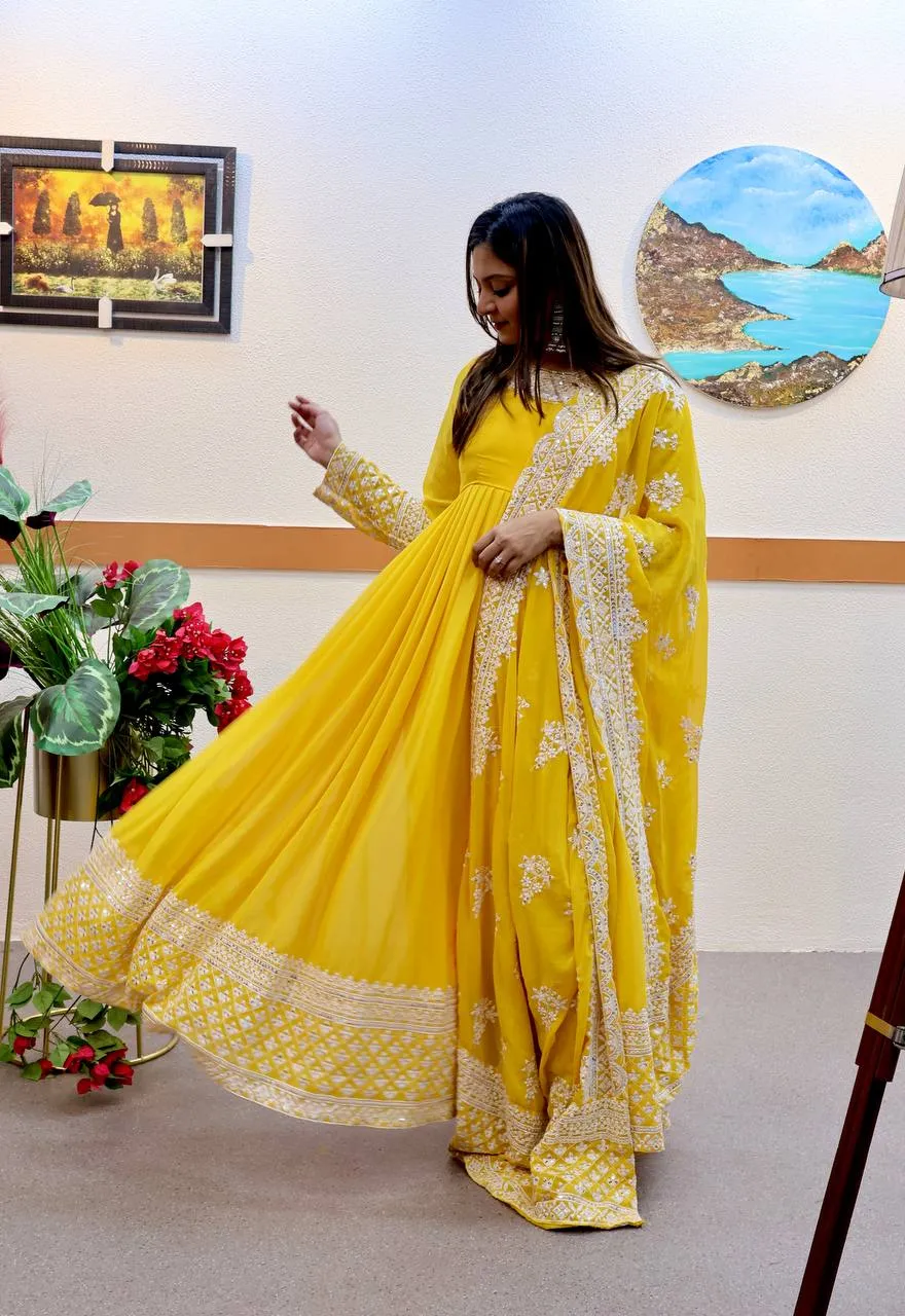 Yellow Fox Georgette Sequin Embroidered Gown with Flowing Skirt and Matching Dupatta