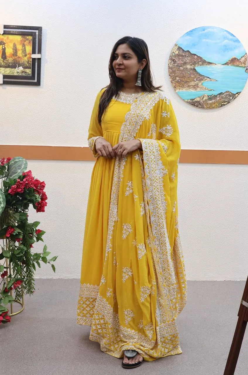 Yellow Fox Georgette Sequin Embroidered Gown with Flowing Skirt and Matching Dupatta